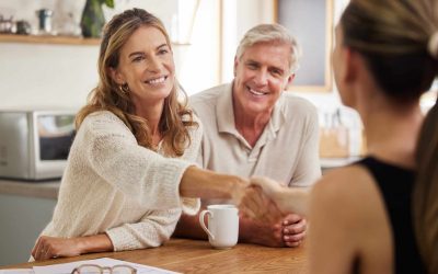 A Senior Couple Meets With An Elder Law Lawyer To Discuss Financial Literacy And Start Building A Strong Support Network.