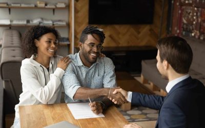 A Young Couple Meeting With A Lawyer About Estate Planning For Young Adults.