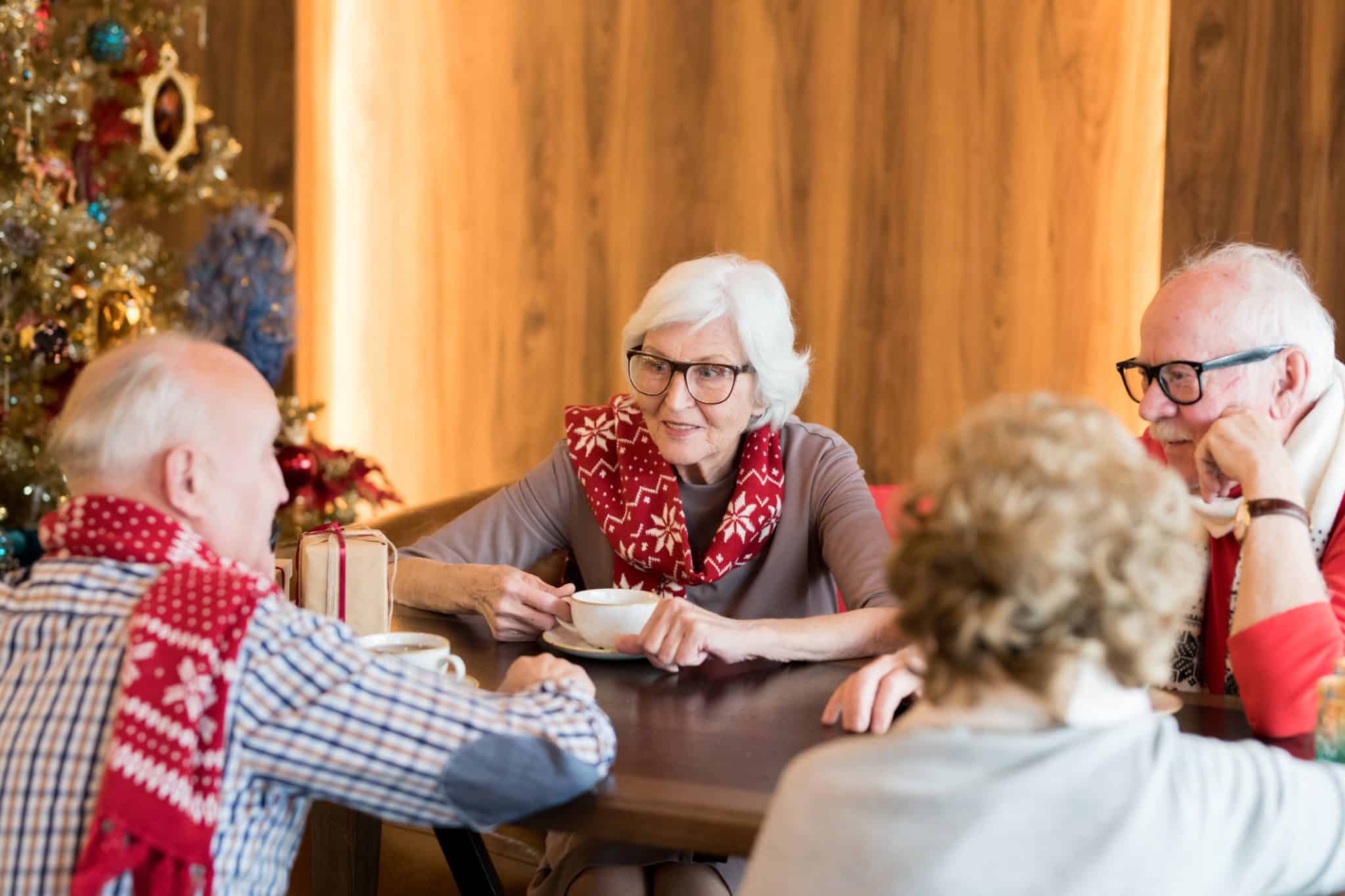 Two couples spend time together and grab coffee during the holidays